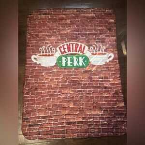 official FRIENDS merchandise Central Perk fuzzy blanket.